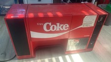 coca-Cola brakemate With coin op. And water storage.