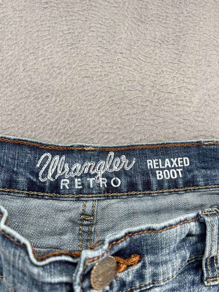 Pantalones de mezclilla Wrangler retro para hombre 34x32 lavado claro relajado bota corte bota elástico Foto 4 de 4