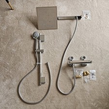 Aqualisa thermostat bar shower mixer with adjustable shower head.