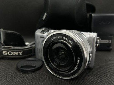 SONY Alpha a NEX-5R 16.1 MP silver with 16-50mm OSS Lens Multilingual 7598 Shots