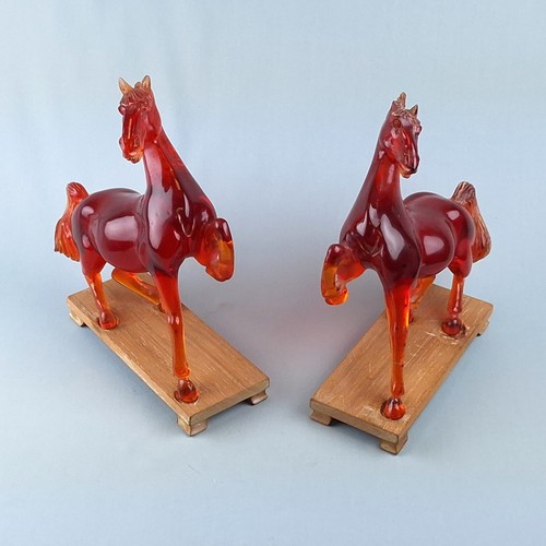 A pair of antique Chinese, carved cherry amber color(acrylic), horse figures - Picture 3 of 11