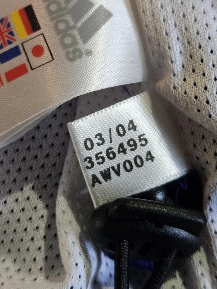 Chaqueta deportiva Adidas Climaproof 2004 vintage en púrpura y blanco talla mediana Foto 4 de 4