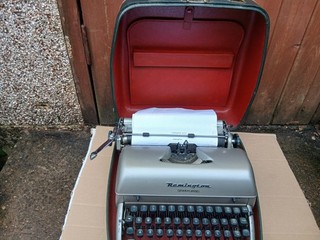 vintage portable Remington "quiet riter" with manual 1950 s working order