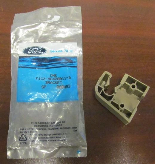 1991-93 NOS Ford Escort Tan Luggage Compartment Cover Bracket - Image 3 of 4