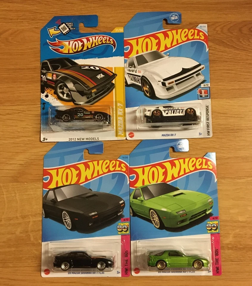 Lote de 4 autos Hot Wheels 2012 nuevos modelos y primera respuesta 1983 Mazda RX-7 Foto 2 de 4