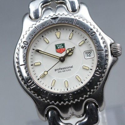 Near MINT TAG Heuer S/el WG1112-0 Date White Dial Quartz 35mm Men's Watch