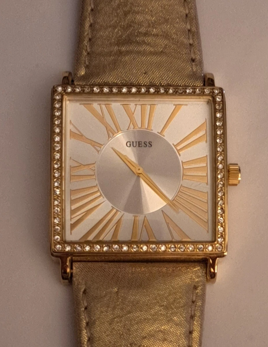 Women's gold top square face watch