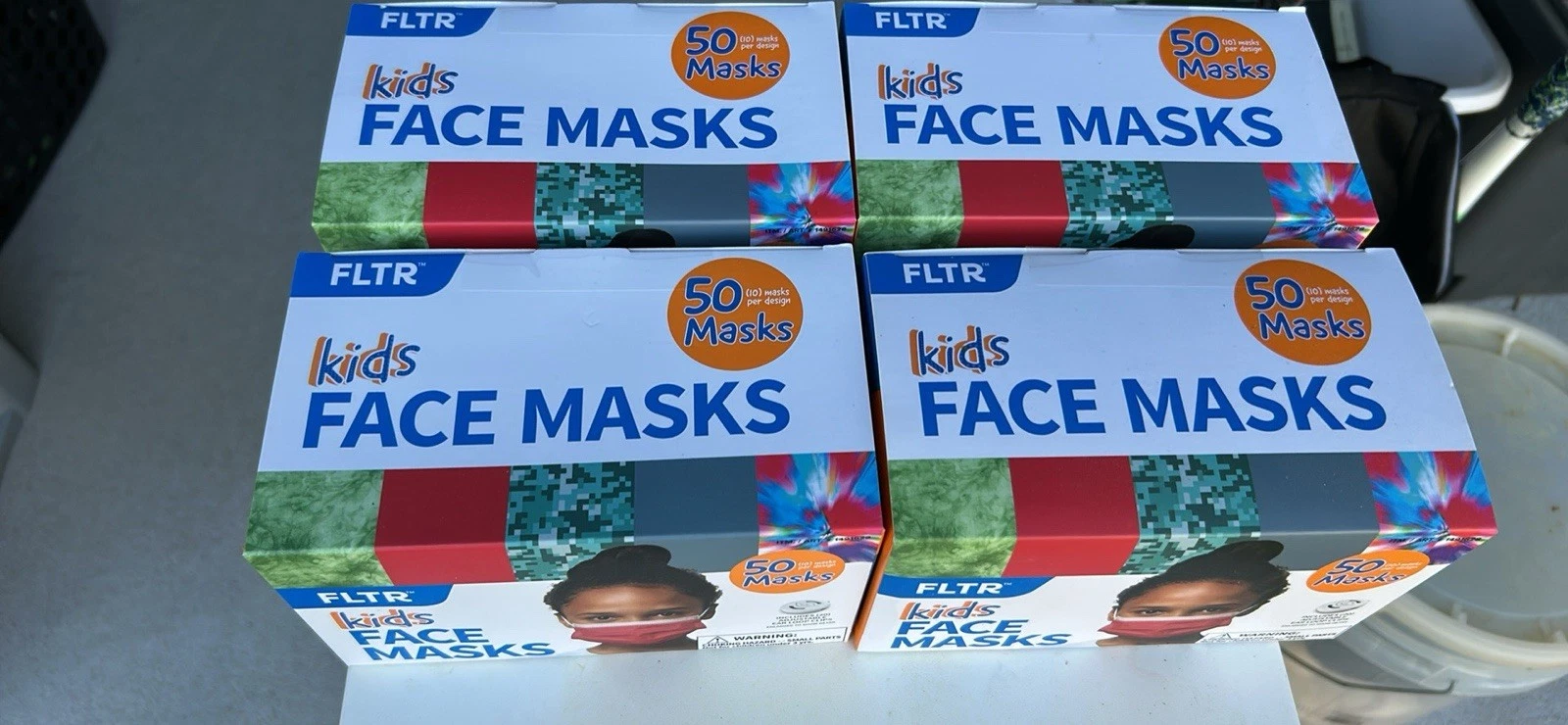 4 Boxes Of Kids Face masks 50ct With Five Different Designs