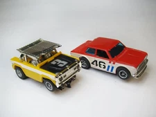 Two (2) Aurora A/FX Slot Cars, Baja Bronco & Bre Datsun 510