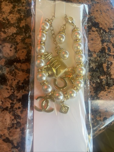 Armband Chanel Geschenk Charms 2023