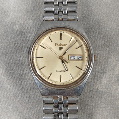 #ad Vintage 1980s Pulsar Y563 Quartz Day Date Men#x27;s 36mm Watch Silver Steel Bracelet $26.24