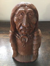 HAND-CARVED BY MASTER CARVER. WALNUT INDIAN HEAD AND BUST 9" HT X 5" ACROSS 
