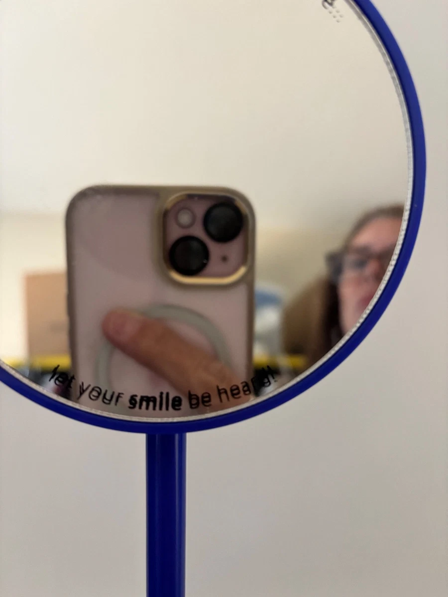 southwest airlines mirror / headset holder customer care let your smile be heard