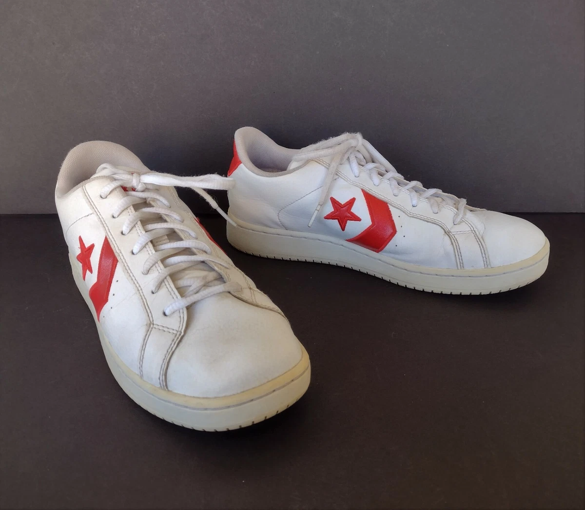 White and red store leather converse