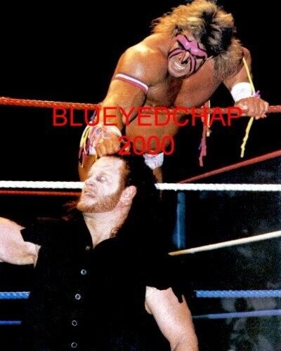 ULTIMATE WARRIOR VS THE UNDERTAKER WRESTLER 8 X 10 WRESTLING ULTIMATE WARRIOR VS THE UNDERTAKER WRESTLER 8 X 10 WRESTLING