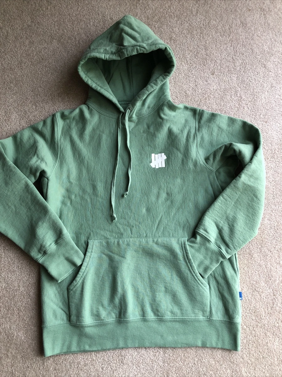 UNDEFEATED Icon sage green white strike logo fleece lined hoodie