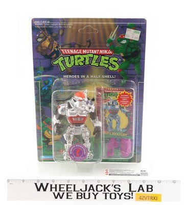 Robotic Rocksteady CAS GRADED 80 80/80/85 TMNT 62-Back 1994 Playmates Figure