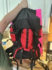 MAKE OFFER  Bug Out Backpack And Book. Bag Has 5+ Pockets Plus Survival Guide