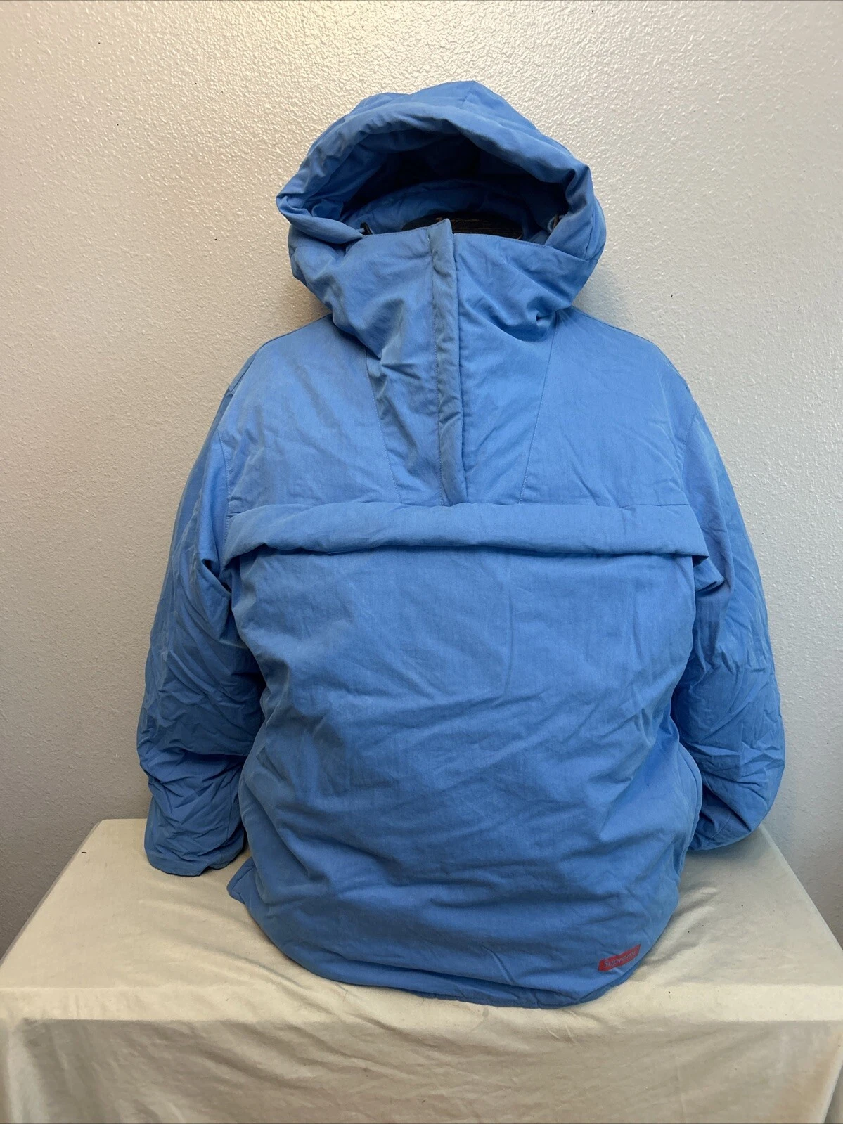 Pull Supreme à capuche bleu vif occasion en l'état grand