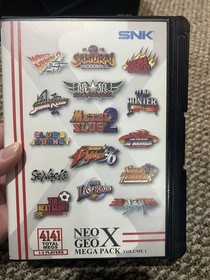SNK NEO GEO X GOLD System CIB With Mega Pack CIB And Rose Colored Stand