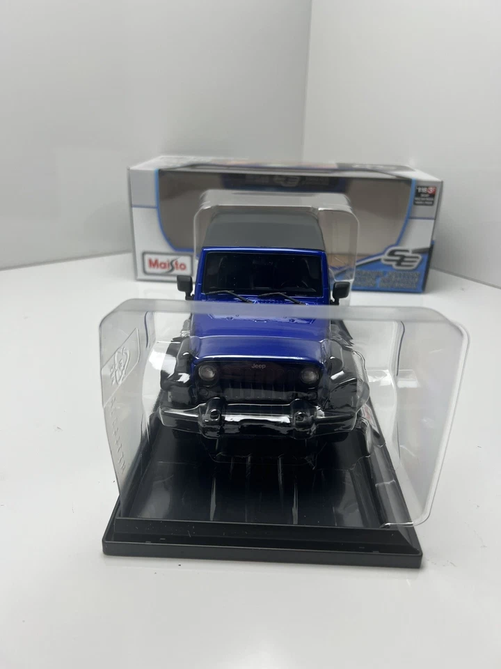 MAISTO 1: 18 比例 - 2014 Willys Jeep 牧马人蓝色 - 压铸模型车 — 第 3/4 张图片