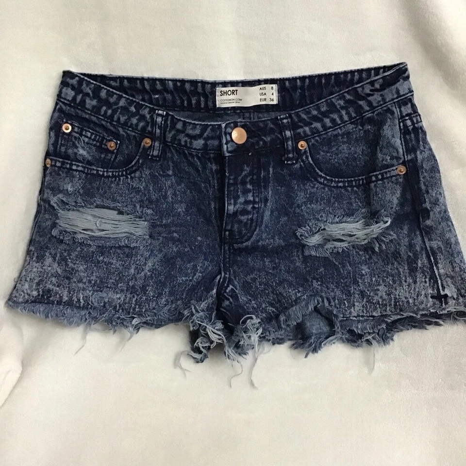 Pantalones cortos informales de jean de algodón para mujer talla 4 azules desgastados con dobladillo crudo Foto 2 de 4