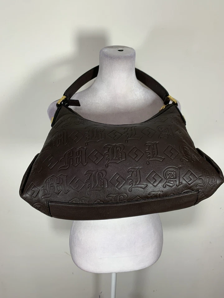 Bolso de hombro hobo a rayas de cuero en relieve L.A.M.B para mujer usado, pero parece nuevo Foto 4 de 4