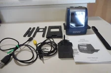 A film scanner converts to digital. Memory card or stick.