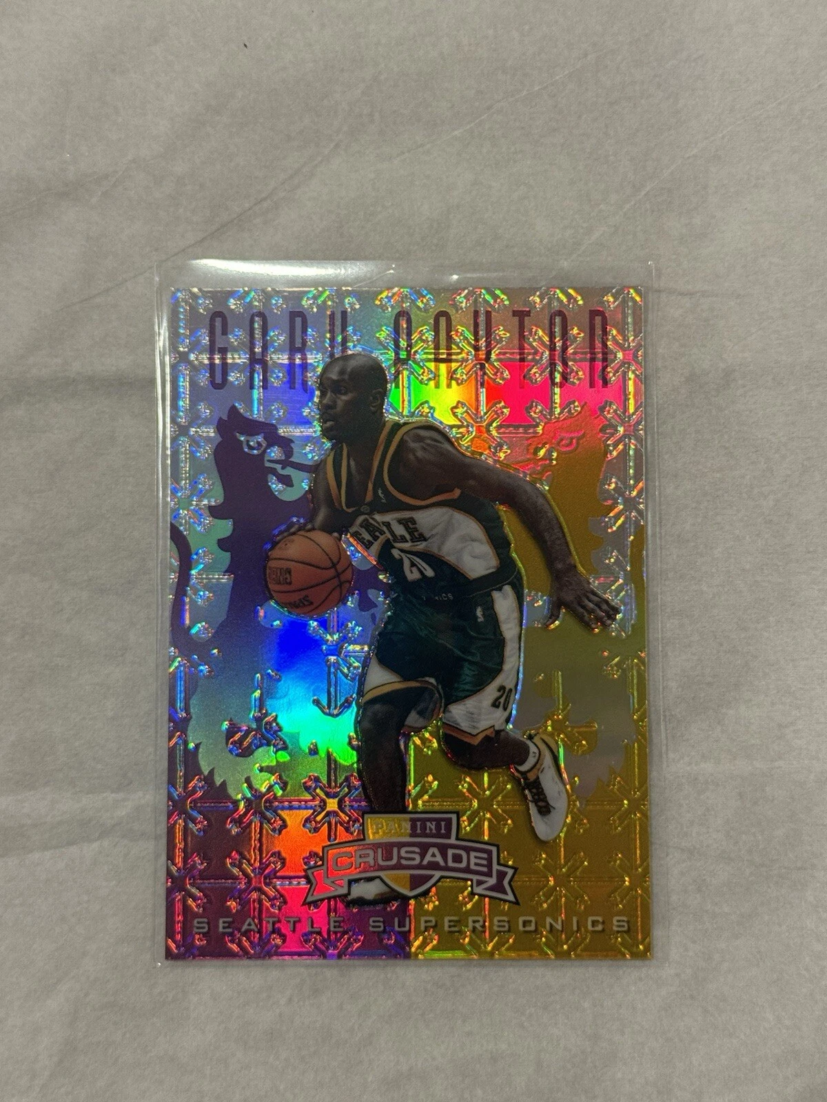 2012-13 Panini Crusade Purple Prizm Gold Gary Payton /49 Supersonics Card