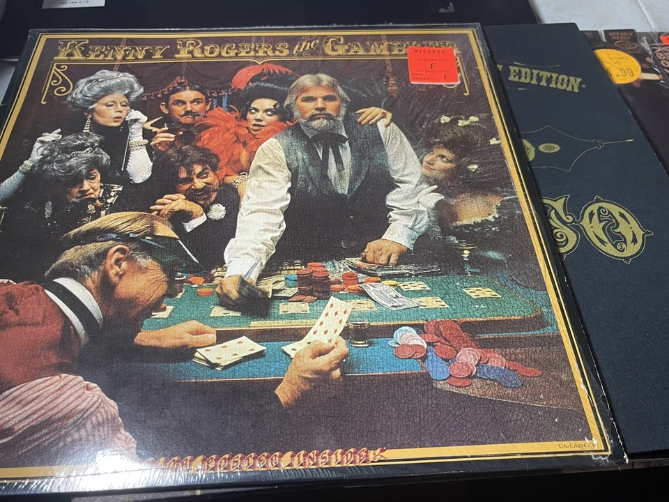 Very cool Kenny Rogers collection: 33/45 rmp vinyl, unopened CDs, sheet music... - Image 4 of 4