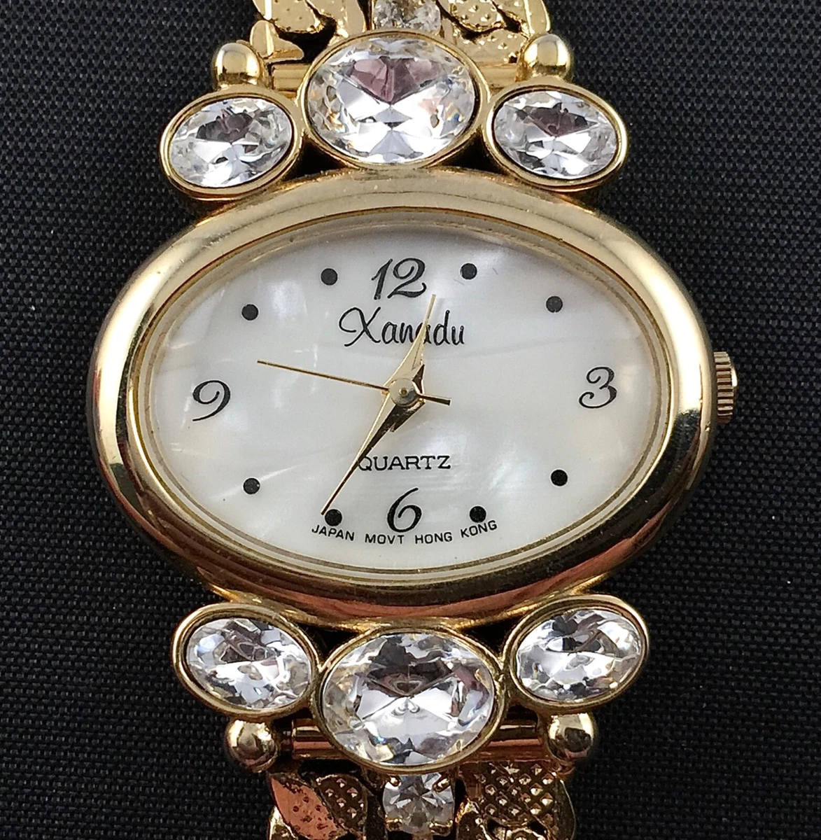 VTG XANADU LADIES GOLD TONE QUARTZ WATCH MOTHER OF PEARL FACE RHINESTONES WORKS