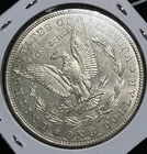1884-S MORGAN SILVER DOLLAR, AU DETAILS.