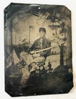 Civil War Tintype of Union Soldier holding Calvary Sword with Tent and Flags