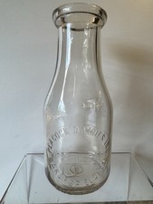 PEACOCK DAIRIES INC. Bakersfield, California Pint Embossed Milk Dairy Bottle