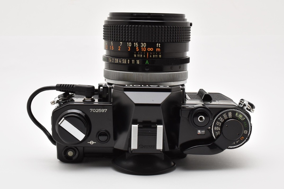 【完動品】Canon AE-1 bk / FD 50mm F1.4 S.S.C. NEAR MINT w/Data Back] Canon AE-1 black Film Camera FD 50mm