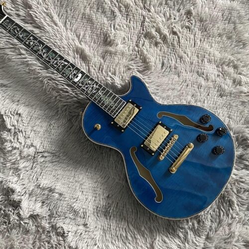 Guitare électrique bleue corps creux frette noire incrustation de fleurs matériel doré - Photo 1 sur 7