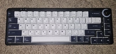 GK GAMAKAY LK67 black with creamy yellow keys and japanese caps.