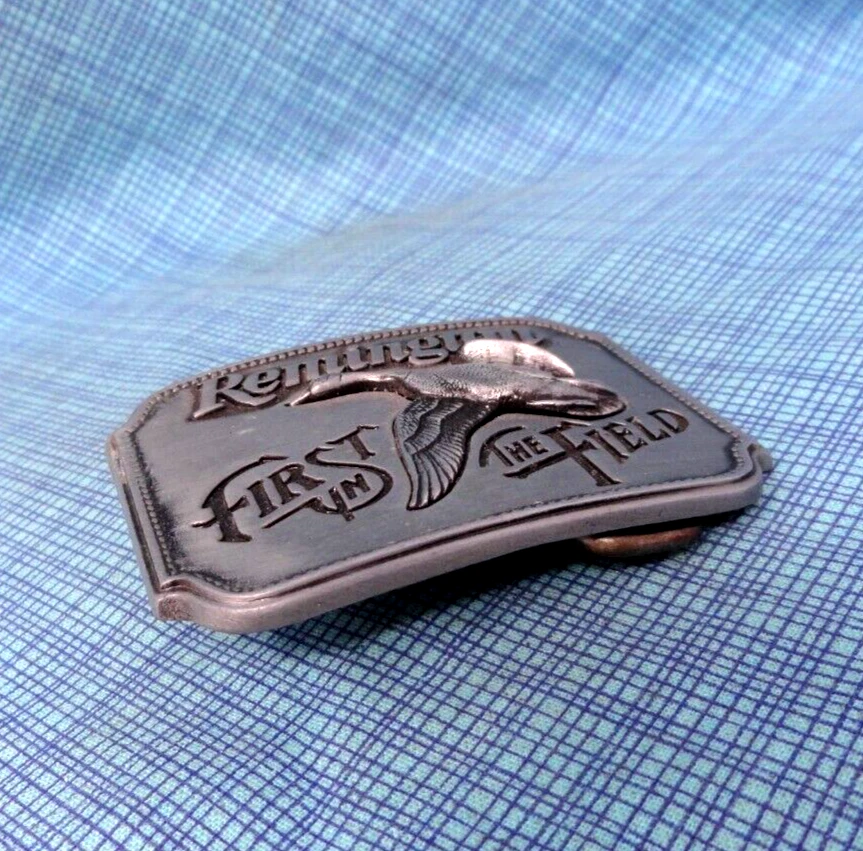 Remington Arms Co abito promozionale cintura fibbia Canada Goose Sid Bell vintage anni 80 W.NOX675