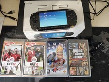 Sony PSP 1003 Handheld Console new charger and games 