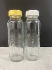 2 Vintage Evenflo Glass Baby Bottles 8 Ounces With Lids rings