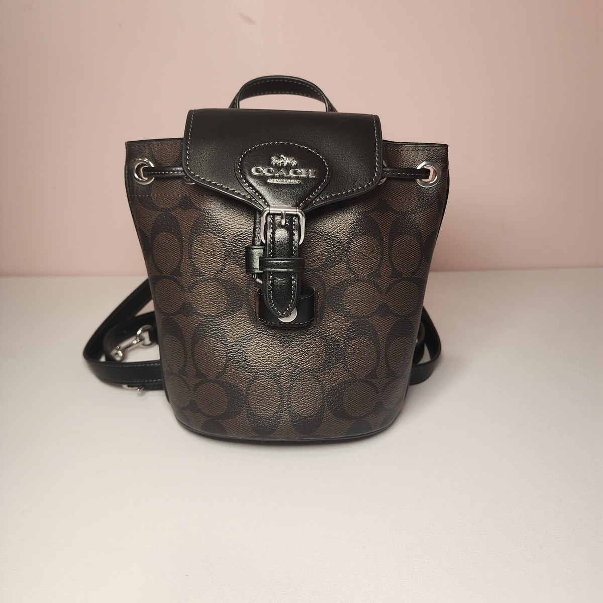coach amelia backpack Saddle Bag in Military Green – Chic Boutique Consignments Soft pebble leather Inside zip pocket Snap closure fabric lining Top handle with 1 1/2 drop Adjustable straps convert bag to a crossbody bag from a backpack 6 1/4 (L) x 7 1/2 (H) x 3 1/2 (W) Style No. Coach CL458 Signature Amelia Backpack
