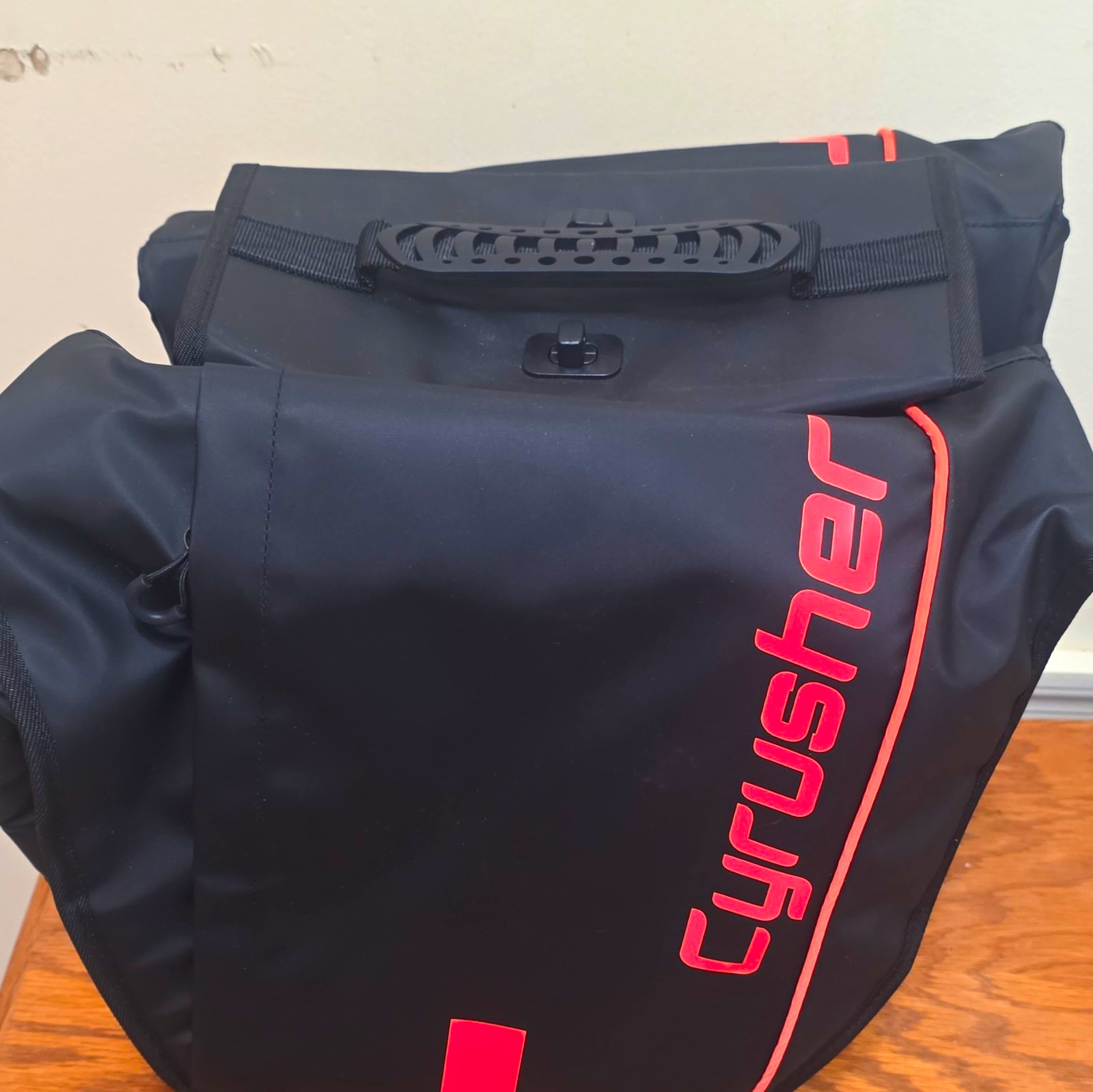 (New without tags) Cyrusher Rear Single Bike Pannier Bag 20L Carry Handle Polyester Black/Red (120.00 USD)