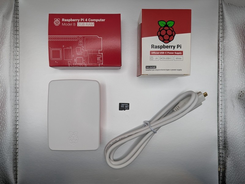 Raspberry Pi 4 Model B 2GB Starter Kit - Sealed Pi - PSU Case HDMI SD Card Book