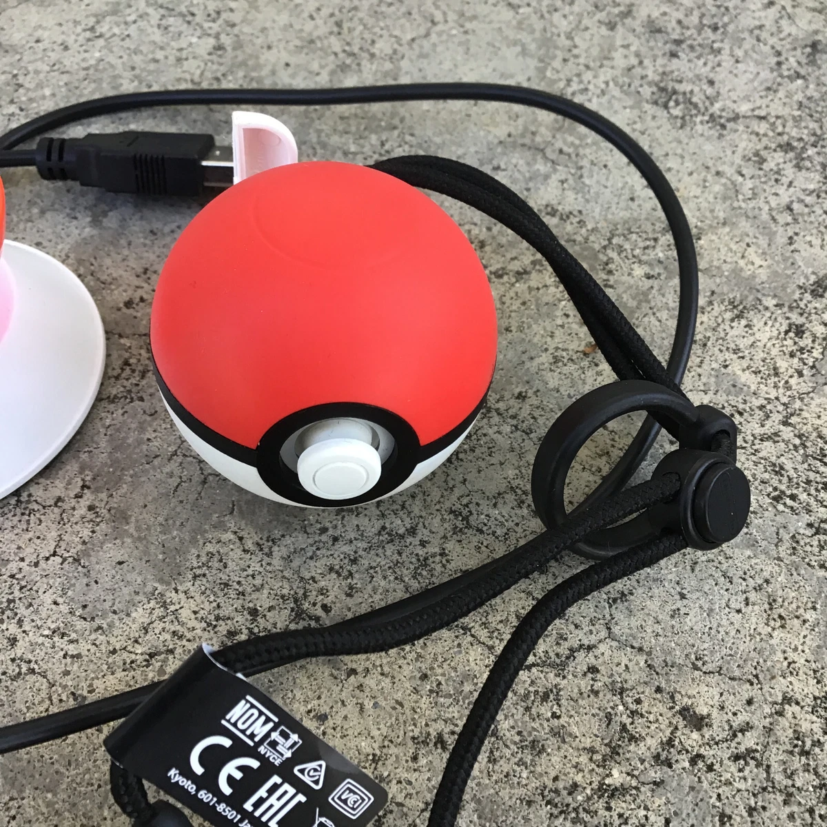 Does the pokeball plus come with best sale a charger
