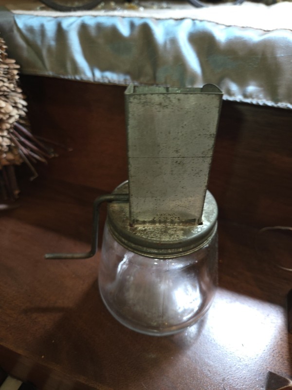 vintage manual nut meat chopper with a Hazel Atlas glass jar base.The chopper...