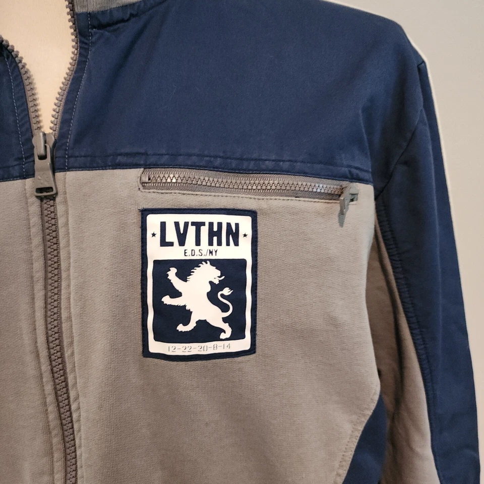 Chaqueta de Pista EXPRESS Gris con Rayas Blancas para Brazos - Parches Honor 30 León - Para Hombres XL Foto 2 de 4