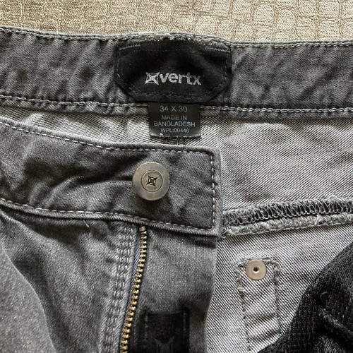 Pantalones de mezclilla elásticos tácticos Vertx Defiance para hombre 34 x 30 grises articulados hasta la rodilla VTX1230 - Imagen 8 de 13