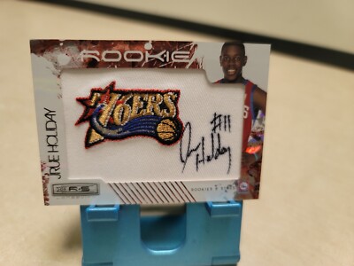2009-10 Panini Rookies & Stars Longevity Ruby Jrue Holiday Auto RPA RC #146 /49