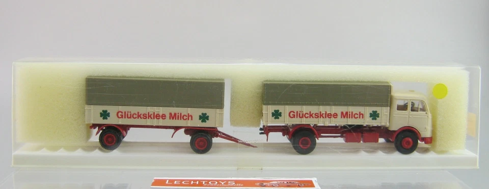 Brekina 1:87 H0, Nr. 7628, Mercedes LP334 , Pritschenhängerzug ,Glücksklee, OVP - Bild 1 von 1