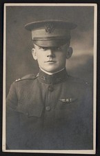 [Unidentified pilot of the Army Air Service in uniform with Dallas wings]